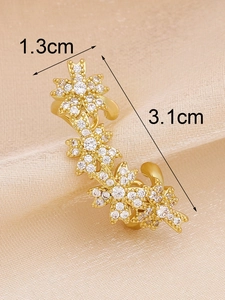 Detailed view of micro-pave zircon floral ear cuff with dimensions 3.1cm by 1.3cm