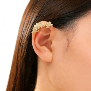 Elegant gold-plated ear cuff with micro-pave zircons in floral star shapes on ear