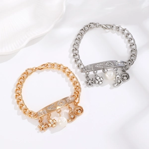 Elegant gold and silver charm bracelets featuring LOVE letter plates and pearl heart pendants