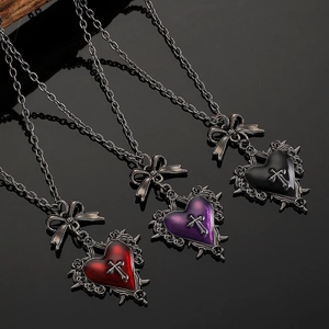 Gothic punk heart cross necklaces with bows in red, purple and black finishes