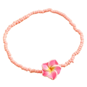 Tobillera bohemia de cuentas rosas con colgante de flor de plumeria para playa verano