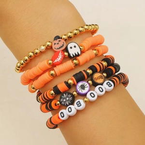 Detail of Halloween beaded bracelet set with pumpkin, ghost charms and BOO letter beads