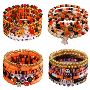 Multi-layer Halloween beaded bracelet set with pumpkin, ghost, and skull charms