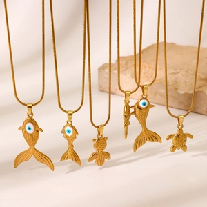 Gold stainless steel fish and sea turtle pendant necklaces with blue evil eye accents