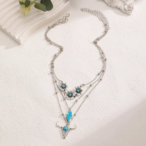 Bohemian western cowboy layered necklace set with turquoise bull skull and lightning pendants