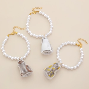 Set di 3 braccialetti di perle a forma di gatto con ciondoli a capsula trasparenti