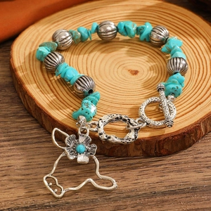 Vintage western cowboy turquoise bead bracelet with silver bull head pendant and T-bar clasp