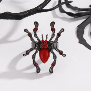 Gothic spider ring detail with red drop gemstone and rhinestones on black alloy base