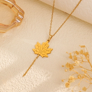 Elegant 18k gold plated stainless steel maple leaf pendant necklace with tassel detail