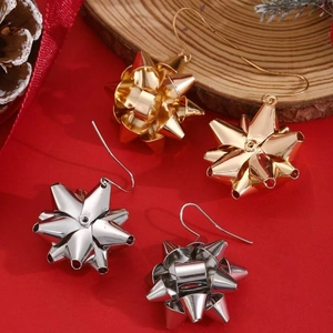 Dettagli di orecchini a fiocco regalo a forma di stella in finitura oro e argento