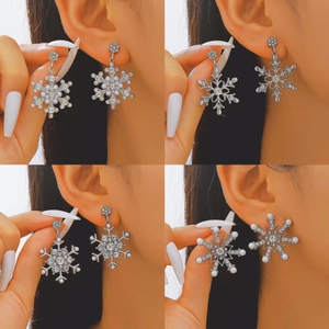 Elegant silver snowflake drop earrings with sparkling rhinestones and pearls for women