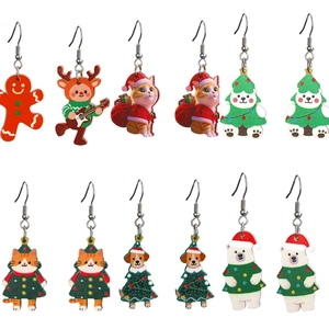 Cartoon Christmas earrings set featuring gingerbread man, reindeer, and festive animals