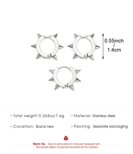 Macro detail of silver punk spike rivets earrings in stainless steel with size measurements