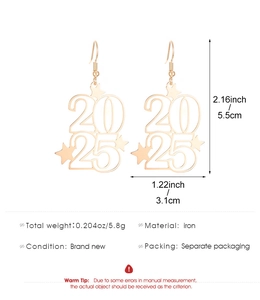Detailed view of 2025 glitter gold earrings with star charms and size measurements