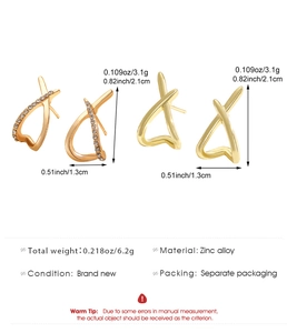 Detail view of cross-shaped X stud earrings with dimensions and weight specs