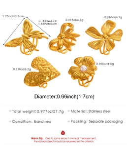 Detailed view of 5-piece 18k gold plated stainless steel ring set with floral and butterfly motifs