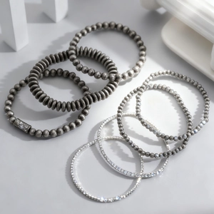 Vintage punk silver beaded bracelet set with rhinestone accents and spiral stretch design
