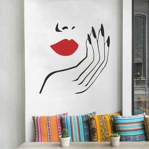 Modern minimalist wall decal featuring a woman’s red lips and hand in artistic line art