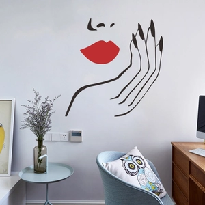 Minimalist wall decal featuring a woman silhouette with red lips and long nails on a grey wall