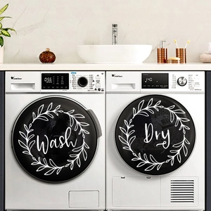 Detailed view of minimalist white Wash and Dry vinyl decals with leaf wreaths on appliances