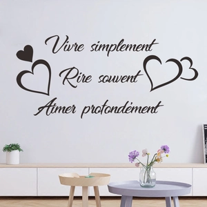 Minimalist wall decal with French quotes and heart shapes for bedroom decor