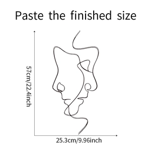 Minimalist abstract face wall sticker dimensions showing 57cm height and 25.3cm width size
