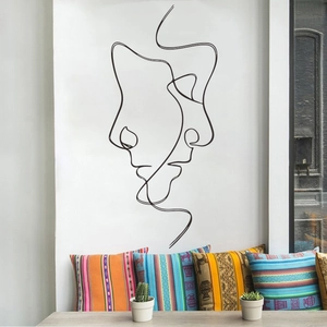 Artistic minimalist line drawing wall decal featuring two abstract faces for home decor