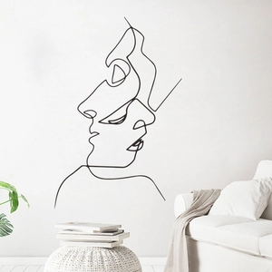 Minimalist single line face art wall sticker in a modern white bedroom setting