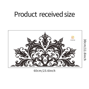 Detail of black mandala wall sticker with symmetric floral patterns and size specifications