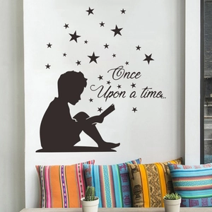 Silhouette wall sticker of a boy reading with stars and Once Upon a Time text