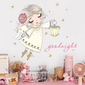 Cute cartoon angel girl wall decal with golden stars and goodnight lettering for nursery