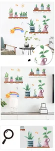 Detail showing watercolor potted plants and rainbow wall stickers with Welcome text