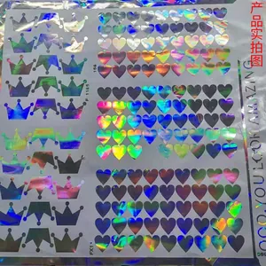 Detail of holographic PET laser film wall stickers with rainbow reflective heart patterns