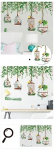 Detail of birdcage and vine wall stickers featuring birds and romantic life text decor