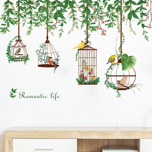Pastoral wall stickers featuring vintage birdcages and green vines with small birds