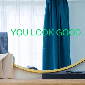 Luminous You Look Good wall sticker for mirrors with a glowing green minimalist design