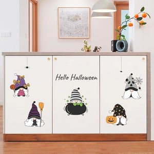 Halloween cartoon gnome stickers with pumpkin and witch hat on white cabinet door