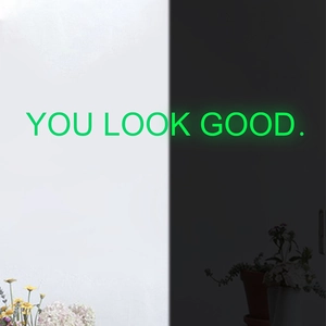 Luminous You Look Good wall sticker with green fluorescent glow in dark background