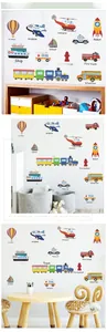 Detail view of cartoon transport wall stickers including planes and ships in a kids room