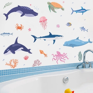 Cartoon sea animal wall decals featuring whale, turtle and shark for bathroom decor