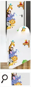 Detail view of colorful cartoon animal wall stickers featuring a giraffe and welcome sign