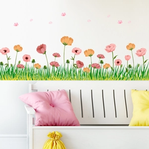 Floral garden baseboard wall decal with pink flowers and green grass for home decor