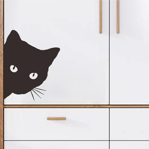 Minimalist black cat wall sticker for cabinets and windows showing a peeking kitten design