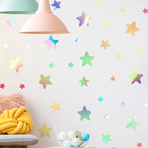 Iridescent holographic star wall stickers in various sizes for dreamy home wall decoration