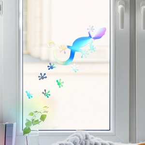 Detailed view of iridescent laser PET gecko window sticker and paw print decals