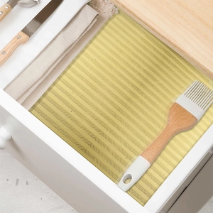 Yellow striped adhesive shelf liner for kitchen drawers with anti-slip wave texture