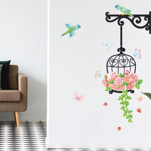 Detailed wall sticker showing vintage birdcages, pink roses and green birds on white wall