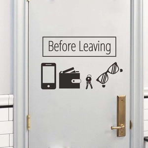 Minimalist black vinyl wall sticker with Before Leaving icons for keys and phone