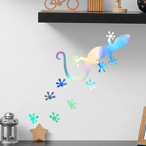 Detailed view of iridescent gecko wall decal with colorful laser effect and footprints