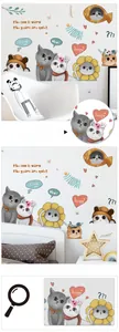 Detail of cute hand-painted cartoon cat wall decals in various fun feline poses